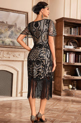 Schwarzes Champanger Kleid mit V-Ausschnitt und Fransen aus den 1920er Jahren mit Pailletten